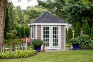 hip roof garden shed with 15-lite double door
