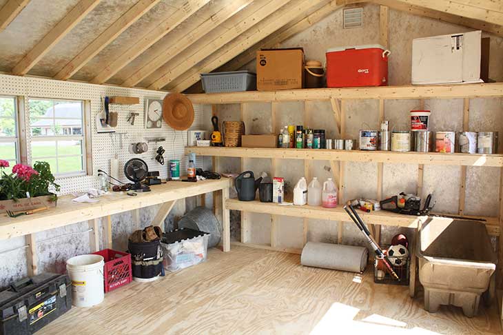 Shed interior with built-in shelves.